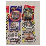 (18) 1/64 Scale Nascar Collectables with Display Stand and Trading Cards