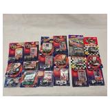 (18) 1/64 Scale Nascar Collectables with Display Stand and Trading Cards