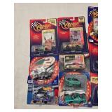 (18) 1/64 Scale Nascar Collectables with Display Stand and Trading Cards