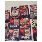 (18) 1/64 Scale Nascar Collectables with Display Stand and Trading Cards