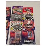 (18) 1/64 Scale Nascar Collectables with Display Stand and Trading Cards