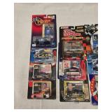 (21) 1/64 Scale Nascar Collectables with Display Stand and Trading Cards