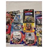 (21) 1/64 Scale Nascar Collectables with Display Stand and Trading Cards