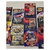 (21) 1/64 Scale Nascar Collectables with Display Stand and Trading Cards