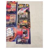 (21) 1/64 Scale Nascar Collectables with Display Stand and Trading Cards