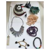 Collection of Gemstone Necklaces and Bracelets with Amethyst, Rose Quartz, Onyx, and Shell Accents