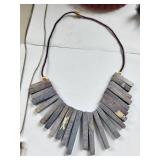 Collection of Gemstone Necklaces and Bracelets with Amethyst, Rose Quartz, Onyx, and Shell Accents