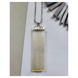 Collection of Gemstone Necklaces and Bracelets with Amethyst, Rose Quartz, Onyx, and Shell Accents