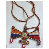 Collection of Handcrafted Indigenous Dolls and Beaded Jewelry