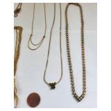 Collection of 10 Gold Tone Costume Jewelry Necklaces with Charms