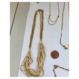 Collection of 10 Gold Tone Costume Jewelry Necklaces with Charms