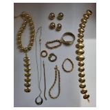 Set of 12 Gold Tone Costume Jewelry Pieces - Necklaces, Bracelets, Earrings