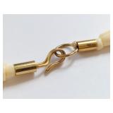 Vintage Handcrafted Beaded Carved Bone Necklace with Intricate Detailing