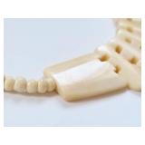 Unique Handmade Bone Necklace with Bead Detailing