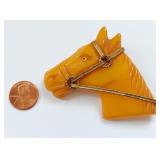 Vintage Bakelite Horse Brooch in Amber Tone