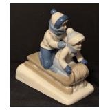 Children on a Sled Porcelain Figurine by Paul Sebastian