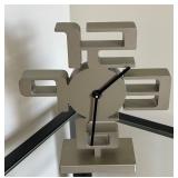 Modern Umbra Wall Clock with Geometric Design