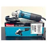 G - Makita 4 1/2 Inch Angle Grinder Model 9557NB with Handle and Guard