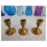 Collection of Colored Glass Vessels and Brass Candle Holders