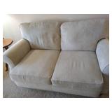 Beige Loveseat & Pillows Beige Loveseat & Pillows