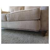 Beige Loveseat & Pillows Beige Loveseat & Pillows
