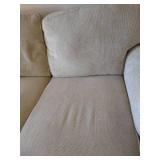 Beige Loveseat & Pillows Beige Loveseat & Pillows