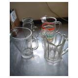 (4) Glass Pitchers (4) Glass Pitchers