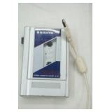 Sanyo Walkman, Sharp Wind-Up Alarm Clock, Garmin, Straps, Dorcy Light, Motorcycle Book