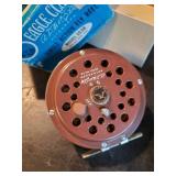 Vintage Fishing Reels 2 with boxes Johnson Century, Eagle Claw, and more