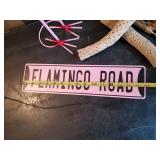 Metal Standing Flamingo, Flamingo Road sign, and wooden Décor