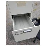 Office Chair and Metal Filing Cabinet
