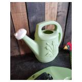 Thexceptional Leaf Rake new, Vintage Cardinal whirligig, and Watering Can