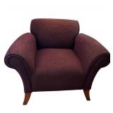 Upholstered Armchair with Rolled Arms and Wooden Legs