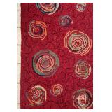 Red Area Rug with Circular Pattern