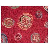 Red Area Rug with Circular Pattern