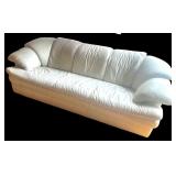 Large White Leather Three-Seat Sofa with Padded Armrests