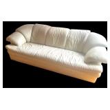 Large White Leather Three-Seat Sofa with Padded Armrests