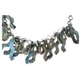 Artisan Metal Statement Necklace with Abstract Dangling Charms