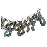 Artisan Metal Statement Necklace with Abstract Dangling Charms