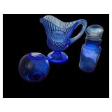 Cobalt Blue Pressed Glass Pitcher, Apothecary Jar, and Art Glass Sphere Set