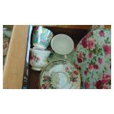 2 Boxes of Assorted Cups & Saucers and Other China Decor