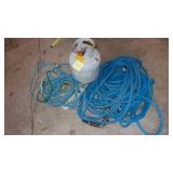 2- Blue Hoses, Electrical Cords and Almost Full Propane Tank.