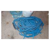 2- Blue Hoses, Electrical Cords and Almost Full Propane Tank.