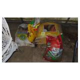 Bags of Soil, Weed and Feed, Compost.