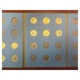 Three 90% Silver and Ten Clad Washington Quarters in Whitman Book