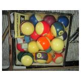 Pool balls, cue sticks, racks and n...