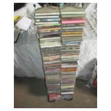 Wire metal CD tower stocked with mu...