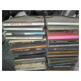 Wire metal CD tower stocked with mu...