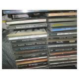Wire metal CD tower stocked with mu...