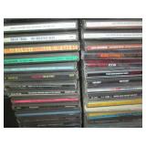 Wire metal CD tower stocked with mu...
